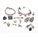 Silver and white metal jewellery including butterfly wing brooches, marcasite brooches and a charm
