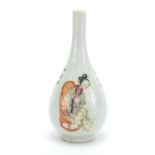 Chinese porcelain bottle vase hand painted in the famille rose palette with a scholar and