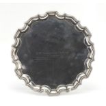 Circular silver three footed salver by Henry Wigfull, Sheffield 1929, 26cm in diameter,