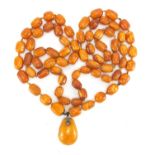 Butterscotch amber coloured bead necklace, 110cm in length, approximate weight 62.0g : For Extra