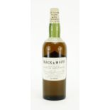 1940's bottle of Black and White scotch whisky : For Extra Condition Reports Please visit our