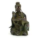 Chinese patinated bronze figure of a Goddess with fish, six figure character marks to the reverse,
