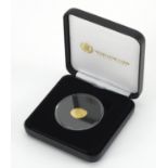 Life and Times of Her Majesty the Queen gold proof crown, with certificate and fitted case : For