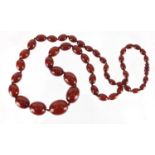 Amber coloured bead necklace, 76cm in length, approximate weight 70.0g : For Extra Condition Reports