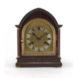 Mahogany chiming mantel clock with architectural columns, silvered chapter ring and Roman
