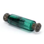 Victorian faceted green glass double ended scent bottle, with unmarked silver mounts, 10cm in length