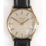 Gentleman's 9ct gold Garrard quartz wristwatch, with date dial and presentation inscription, 3.5cm