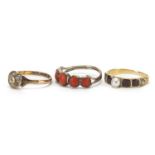 Three antique gold rings including coral, see pearl and garnet, various sizes, approximate weight