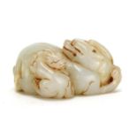 Chinese celadon jade carving of two mythical creatures, 6.2cm wide : For Extra Condition Reports