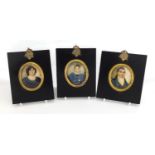 Three 19th century oval hand painted portrait miniatures comprising a male, female and child, each