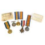 British Military World War I medal groups relating to the Wray family comprising a trio awarded to