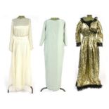 Two 1980's ball gowns and an evening dress comprising Sara Sturgeron, Jack Bryan size 10 and Kofi