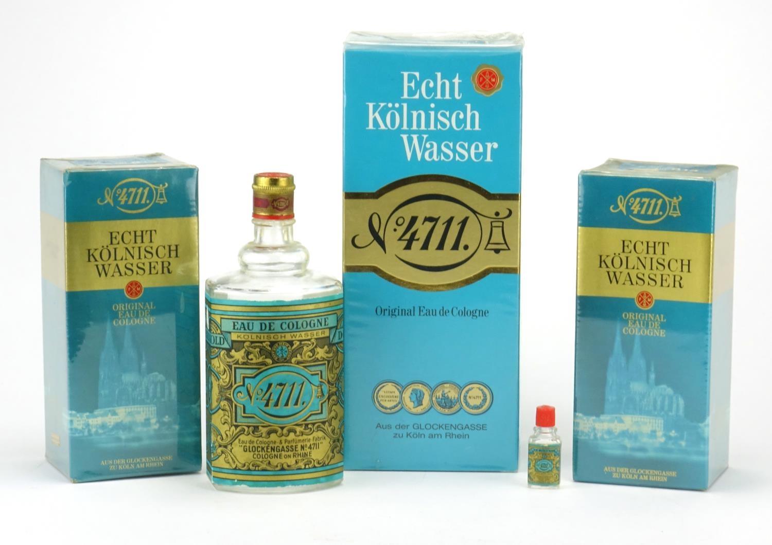 Three sealed bottles and two empty bottles of Echt Kölnisch Wasser Eau De Cologne, the largest 600ml