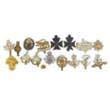 British Military cap badges including Leicestershire Regiment, York and Lancaster Regiment and Royal
