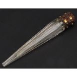 Edwardian cut glass scent bottle, with gilt metal mount and cabochon garnets, 11cm in length : For