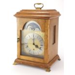 Oak cased Westminster chiming bracket clock, striking on nine bells with moon phase dial, the