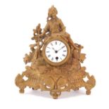 French gilt metal mantel clock mounted with a figure, the enamelled dial with Roman numerals, 32cm