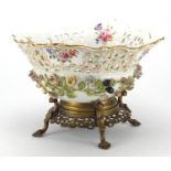 19th century porcelain floral encrusted centre piece, hand painted with flowers raised on a bronze