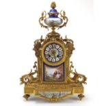 19th century French ormolu eight day mantel clock striking on a bell, with Sèvres style panels and