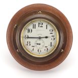 Octo eight day car clock retailed by G Frodsham & Co, with Arabic numerals on circular wooden