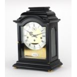 German Westminster Chiming ebonised mantel clock, by Kieninger, the silvered chapter ring with