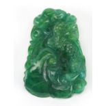 Chinese green jade pendant carved with a dragon, 5cm high : For Further Condition Reports Please