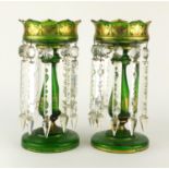 Pair of 19th century green glass lustres, each with floral gilt decoration and cut glass drops, each