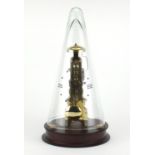 German brass skeleton clock by Franz Hermle retailed by Rapport, houses under a conical glass