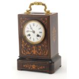 19th century marquetry inlaid ebony mantle clock striking on a bell, the French eight day movement