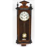 Vienna walnut and ebonised regulator wall clock with enamelled dial and Roman numerals, 85cm