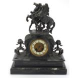 Patinated Spelter black slate and marble mantel clock with marley horses and trainer, striking on