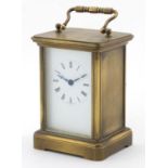 Brass cased carriage clock with enamelled dial and Roman numerals, 11cm high : For Further Condition