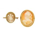 Two cameo brooches with gold mounts including cupid, the largest 3.5cm in length, approximate weight