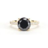 14ct gold black diamond solitaire ring (over 2.00ct) with diamond set shoulders, size L, approximate