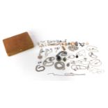 Silver and white metal jewellery including a gate bracelet, cameos, ingot pendant, necklaces and