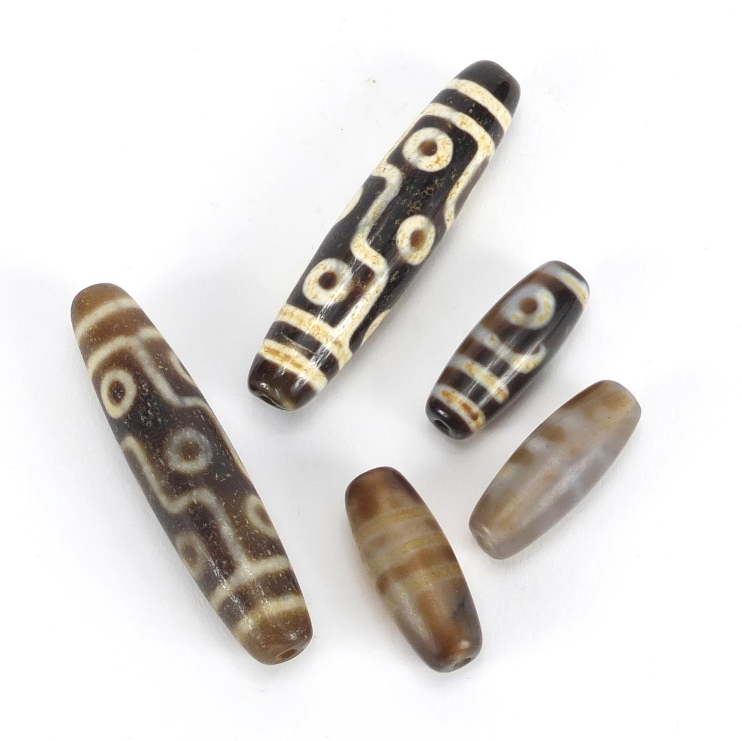 Five Islamic agate beads, the largest 6cm in length : For Further Condition Reports Please Visit Our - Image 2 of 4