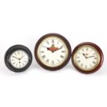 Three wall clocks comprising British Rail, Abbey Clock Co and Fuller's Brewery examples, the largest