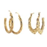 Two pairs of 9ct gold hoop earrings, the largest 2.6cm in diameter, approximate weight 4.0g : For