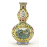 Chinese porcelain yellow ground double gourd wall vase, hand painted in the famille rose palette