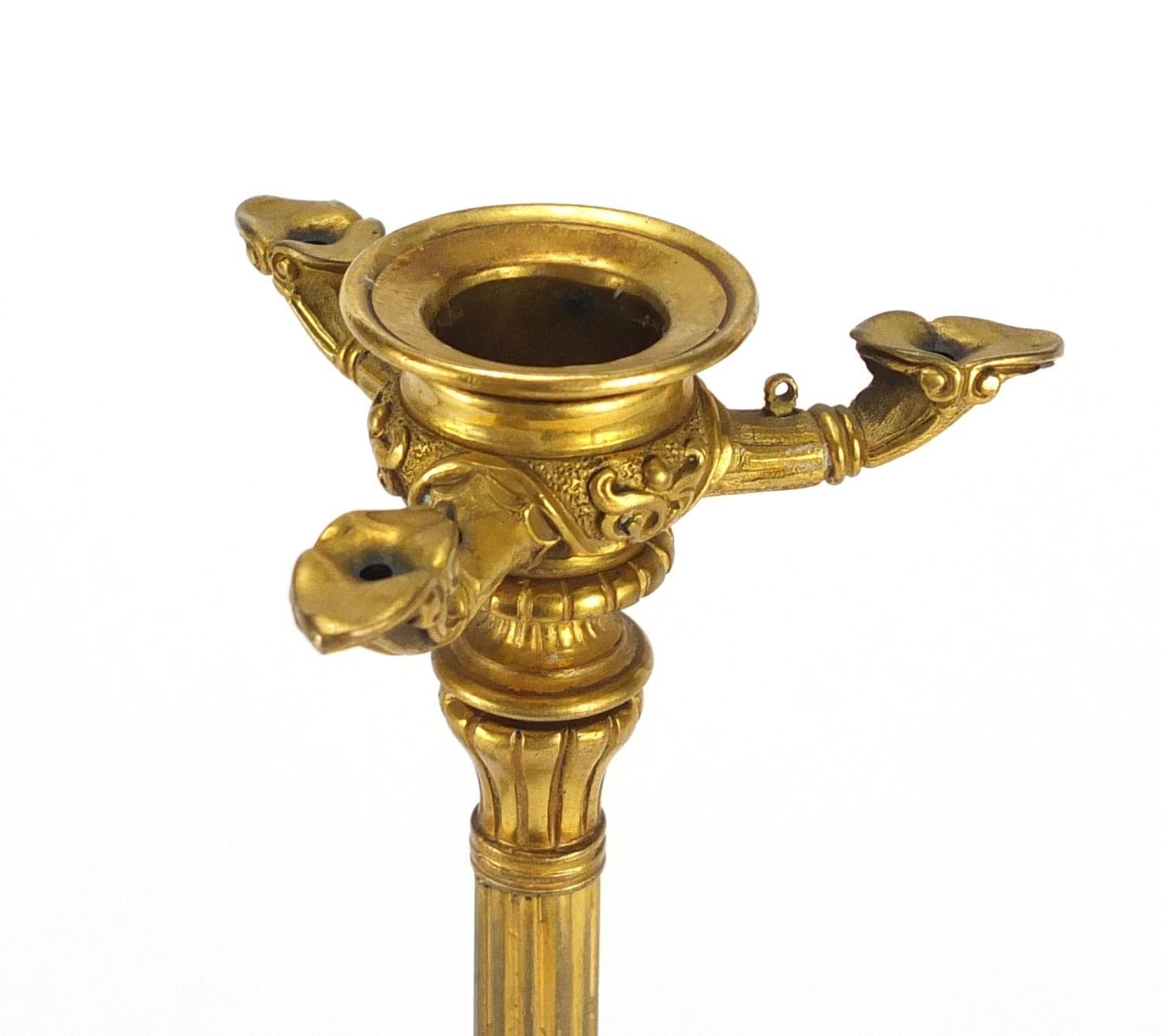 Pair of 19th century ormolu candlesticks with reeded columns, lion masks and claw feet, each 34. - Image 4 of 6