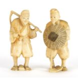 Two Japanese carved ivory Okimono's of workmen, each with character marks to the bases, the