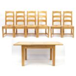 Contemporary light oak extending dining table with extra leaf and six chairs, the table 78cm H x