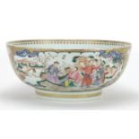 Chinese porcelain punch bowl, finely hand painted in the famille rose palette with panels of figures