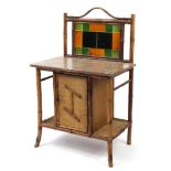 Aesthetic bamboo wash stand with tiled back and marble top above a cupboard, 121cm H x 77cm W x 49cm