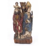 Hand painted religious panel of four figures, 59cm high : For Further Condition Reports and Live