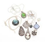 Ten silver pendants some set with semi precious stones and three silver necklaces, approximate