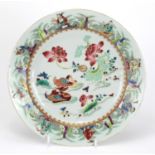 Chinese porcelain plate finely hand painted in the famille rose palette with ducklings amongst