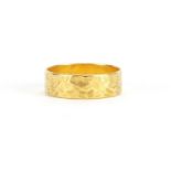 22ct gold wedding band with engraved decoration, size M, approximate weight 3.6g : For Further