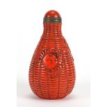 Chinese coral coloured glass crab in a cage snuff bottle with stopper, 8.5cm high : For Further