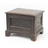 Antique carved oak box with foliate carved concave front panel, 43cm H x 56cm W x 45cm D : For